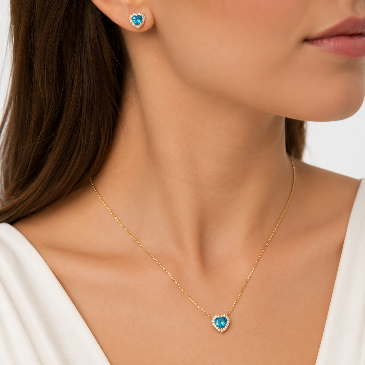 Conjunto Coração Azul Borda Cravejada Banhado a Ouro 18k com Zircônias - 8 mm, 6mm
