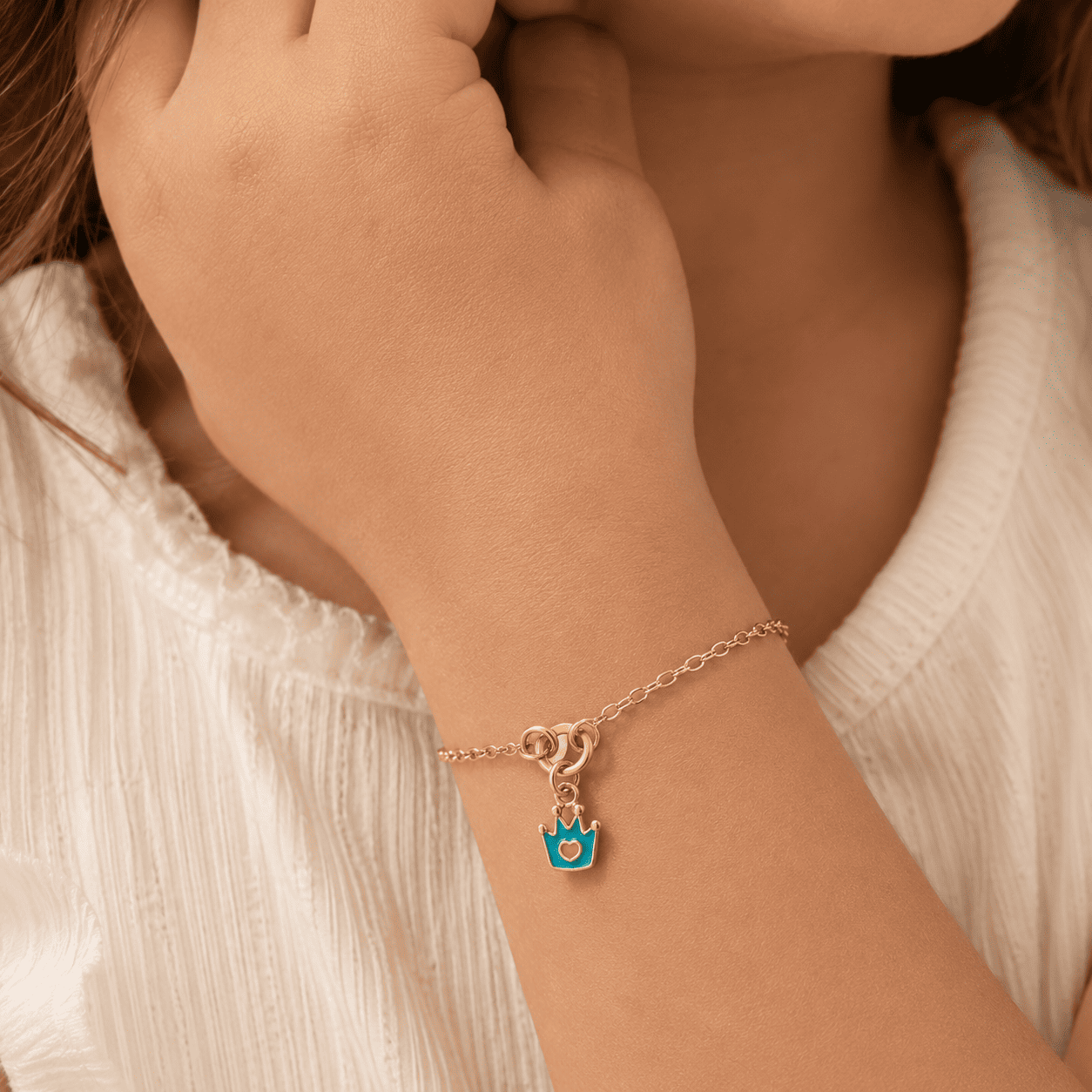 Pulseira Infantil Coroa Azul Banhada a Ouro 18k - 13,5cm + 2cm (alongador)