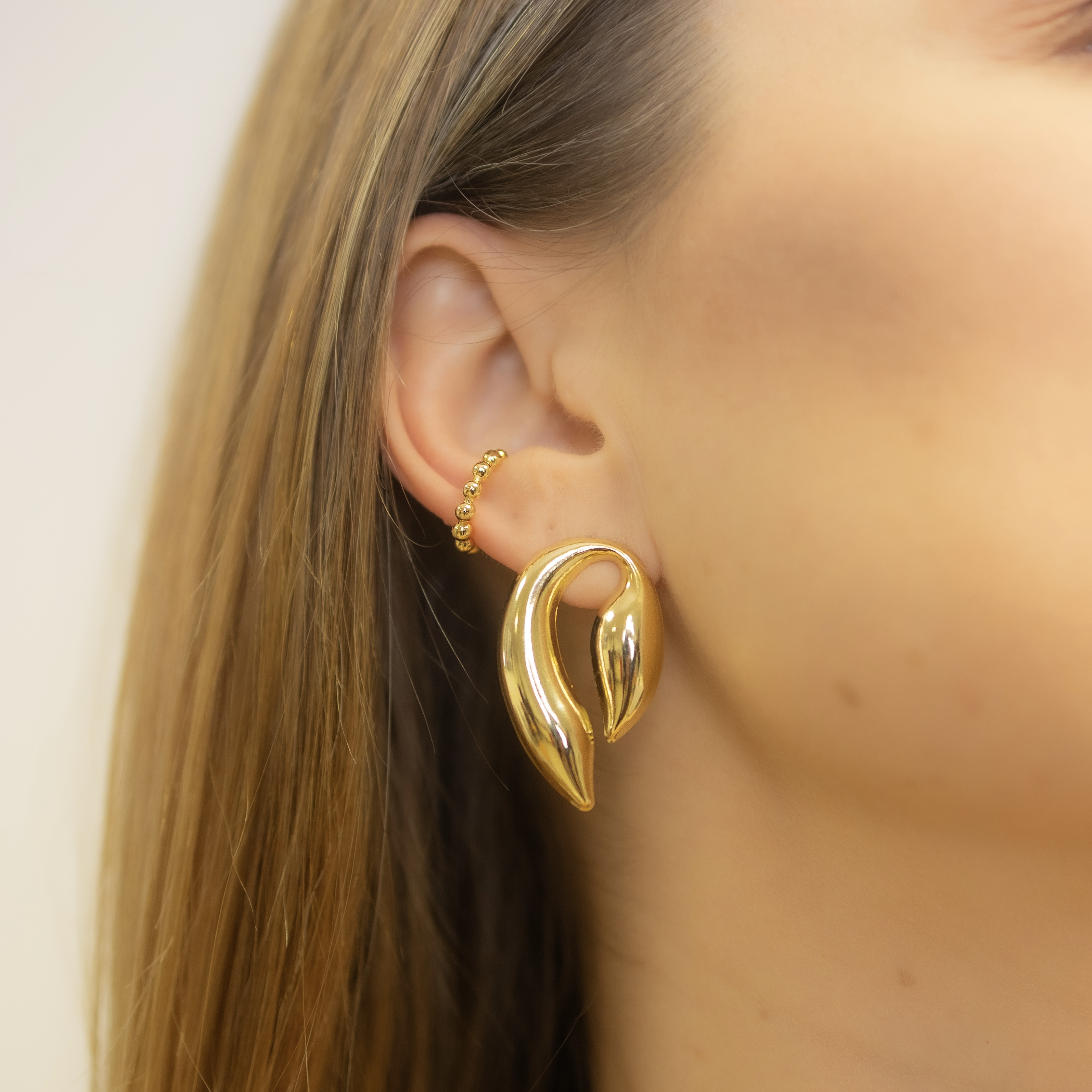 13.0222.0.O - Piercing de bolinhas lisas crescentes
