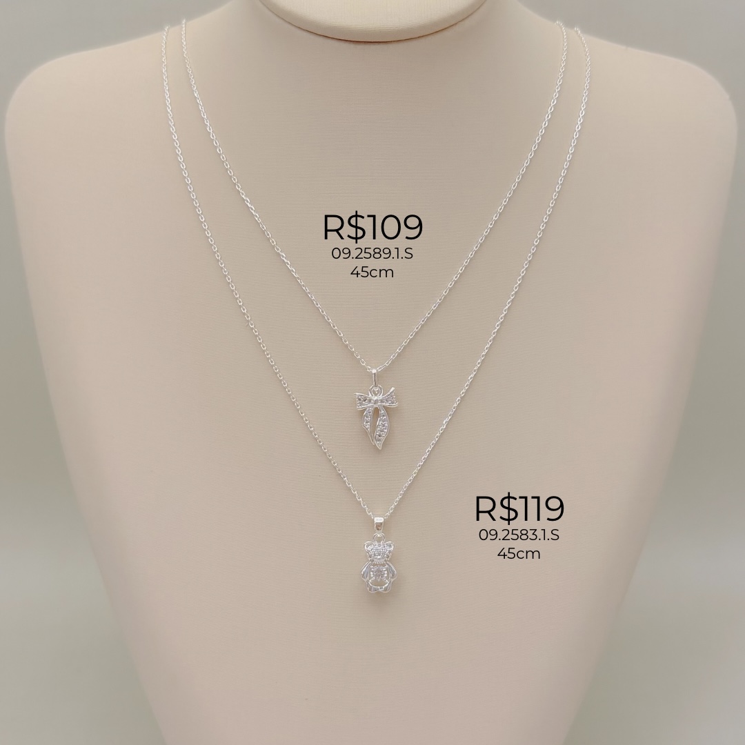 09.2589.1.S - (45) Colar em cartier com pingente de laço cravejado longo