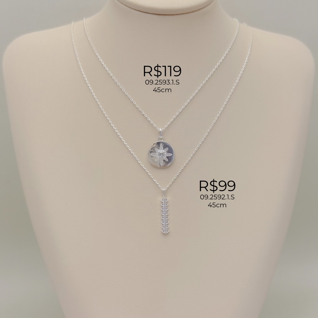 09.2593.1.S - (45) Colar de elo cartier com pingente de rosa dos ventos em moeda com central em ponto de luz