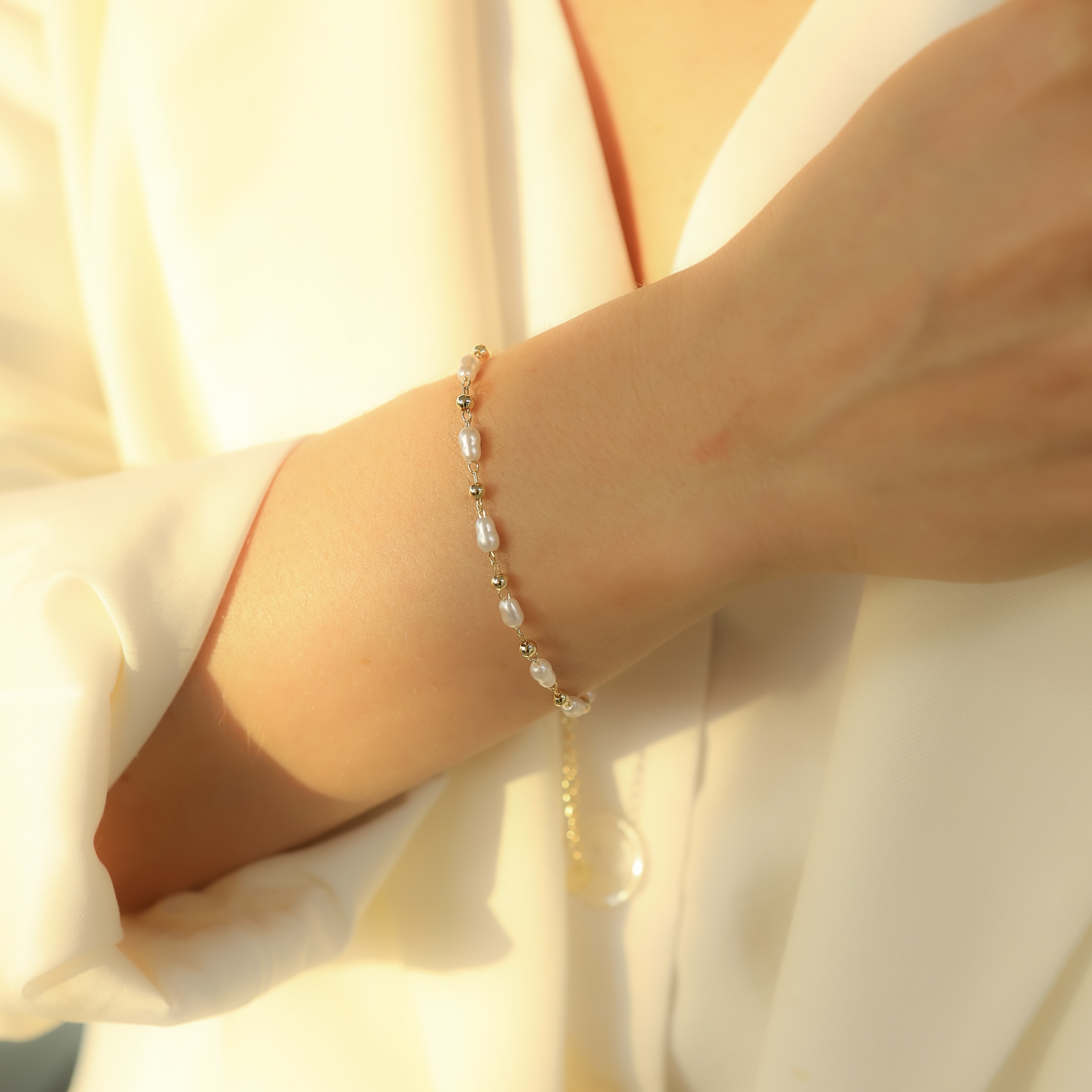 12.2331.15.O - Pulseira de bolinhas e pérolas arroz revezadas