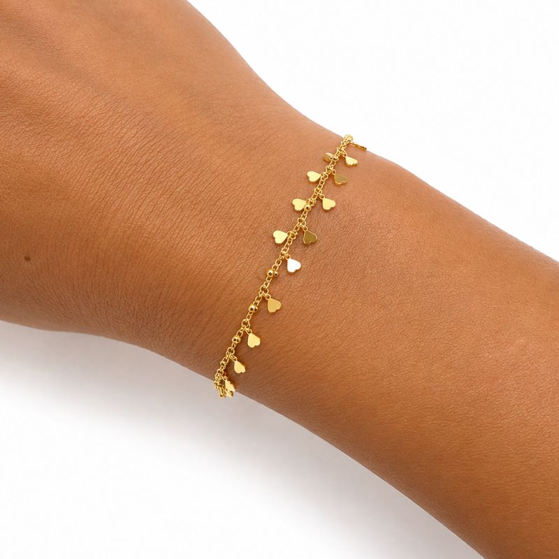 PULSEIRA GRUME COM CORAÇÕES CHAPADOS