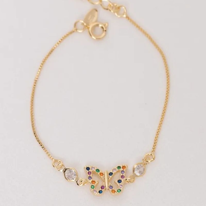 PULSEIRA BORBOLETA COM ZIRCÔNIAS COLORIDAS BANHO OURO 18K