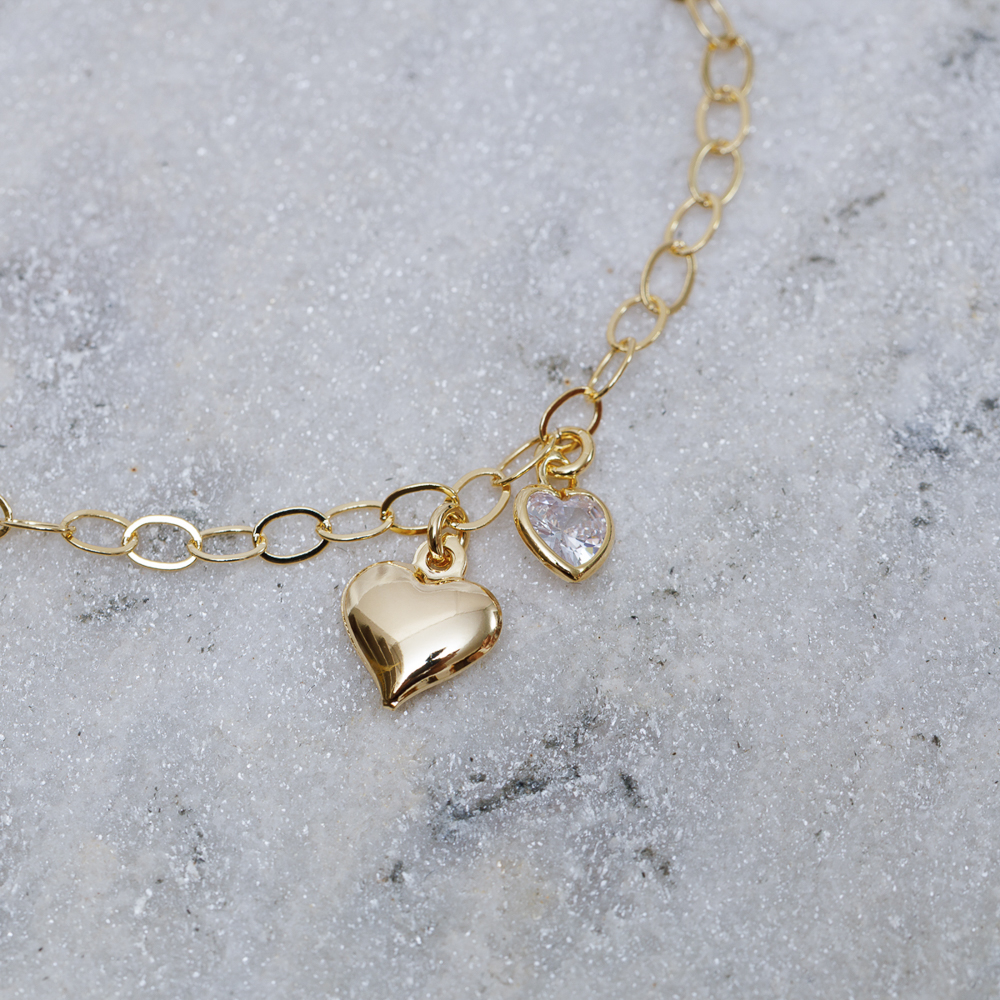 PULSEIRA DOIS CORAÇÕES BANHO OURO 18K