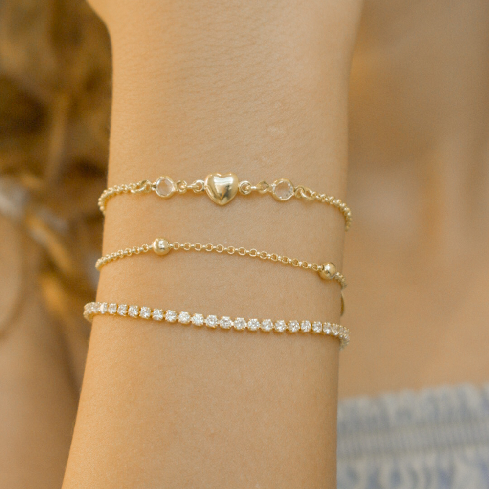 PULSEIRA INFANTIL CORAÇÃO E CRISTAL BANHO OURO 18K