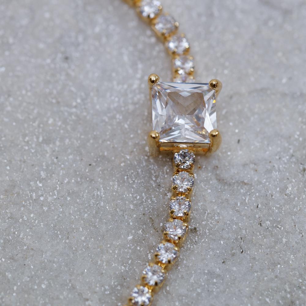 PULSEIRA RIVIERA P CRISTAL BANHO OURO 18K