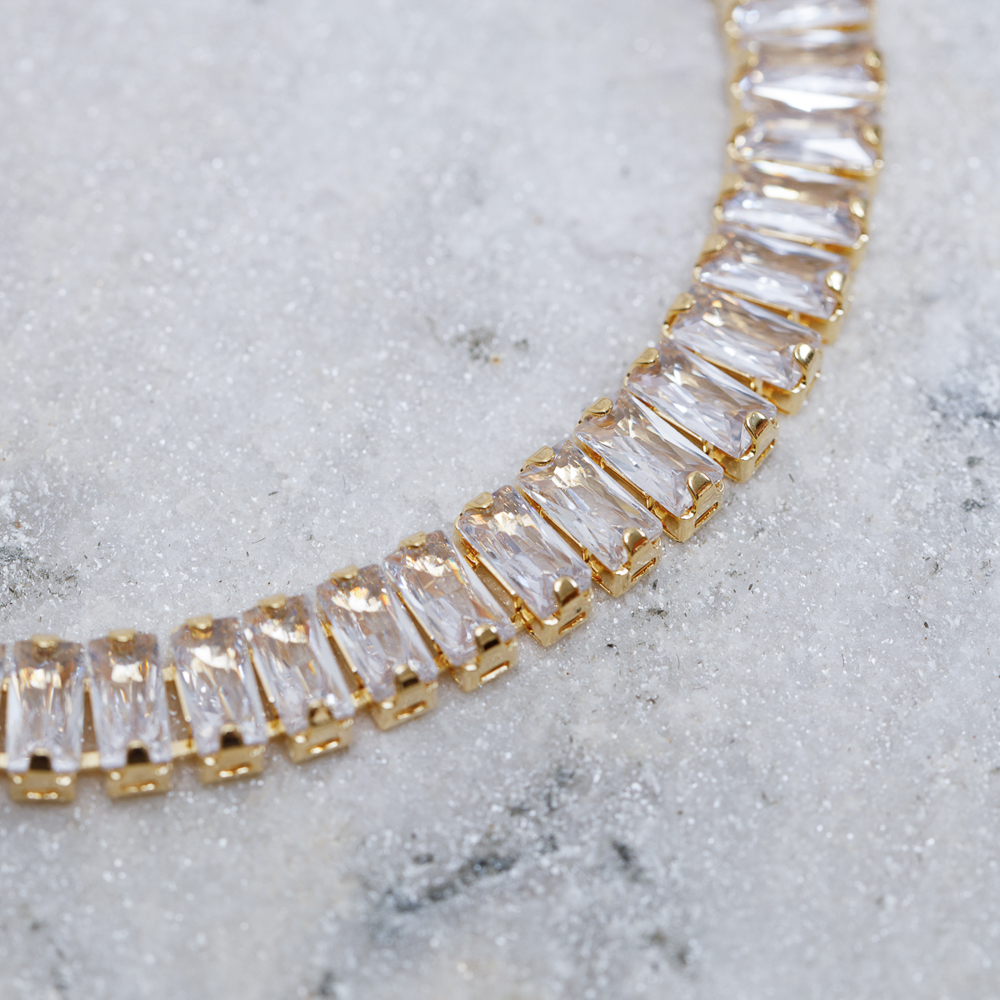 PULSEIRA RIVIERA COM ZIRCÔNIAS NAVETE CRISTAL BANHO OURO 18K