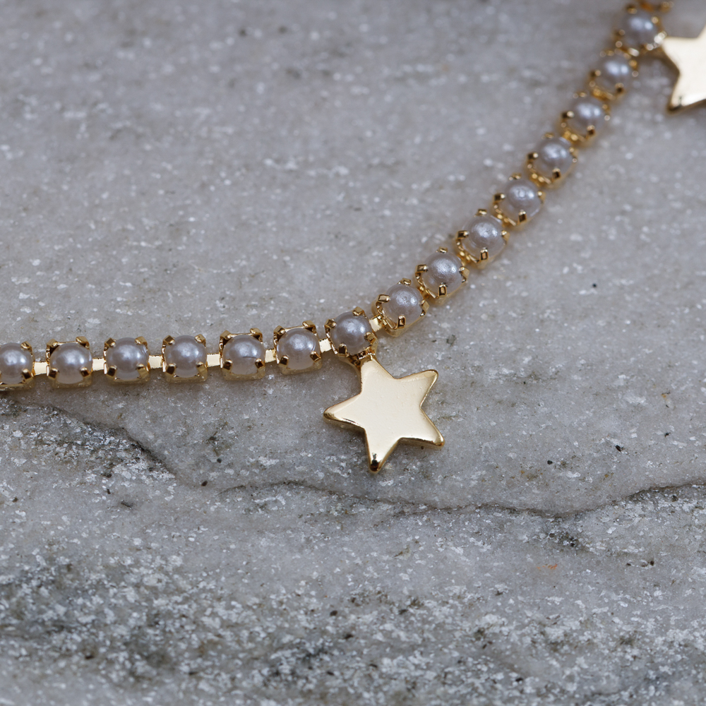 CHOKER PÉROLA RIVIERA COM ESTRELINHAS BANHO OURO 18K