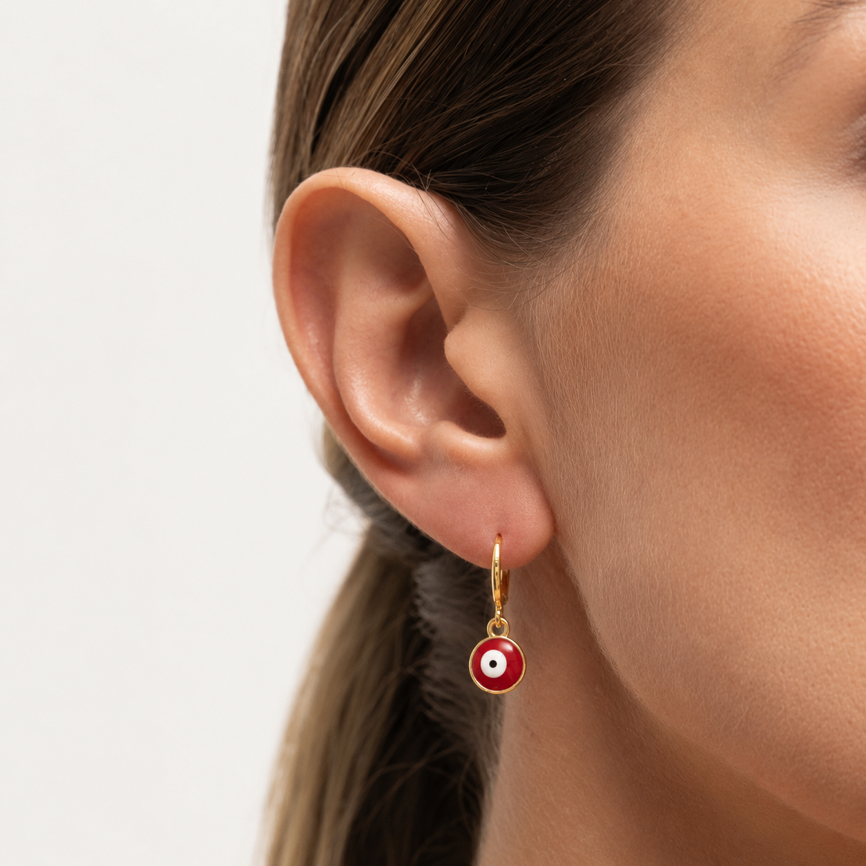 BRINCO ARGOLINHA OLHO GREGO VERMELHO BANHO OURO 18K