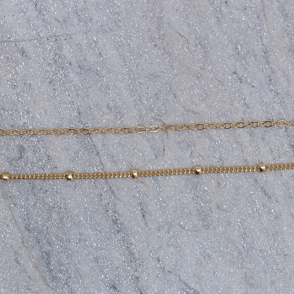 TORNOZELEIRA DUPLA COM BOLINHAS BANHO OURO 18K