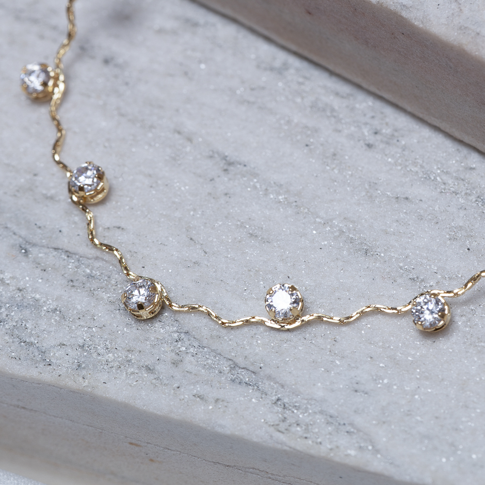 CHOKER ONDULADA COM CRISTAIS BANHO OURO 18K