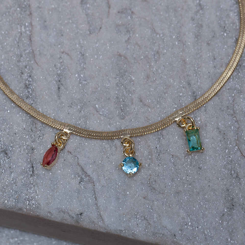 PULSEIRA FITA ESPELHADA COM PEDRAS COLORIDAS BANHO OURO 18K