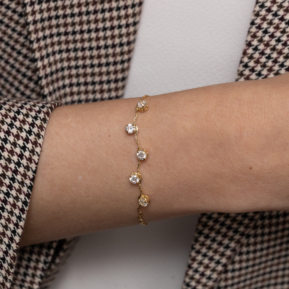 PULSEIRA ONDULADA COM PEDRAS CRISTAIS BANHO 18K