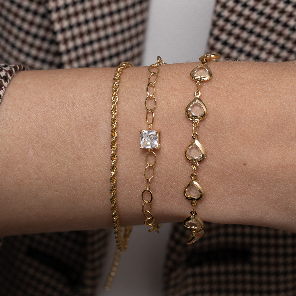 PULSEIRA ELOS OVAIS COM PONTO DE LUZ BANHO 18K