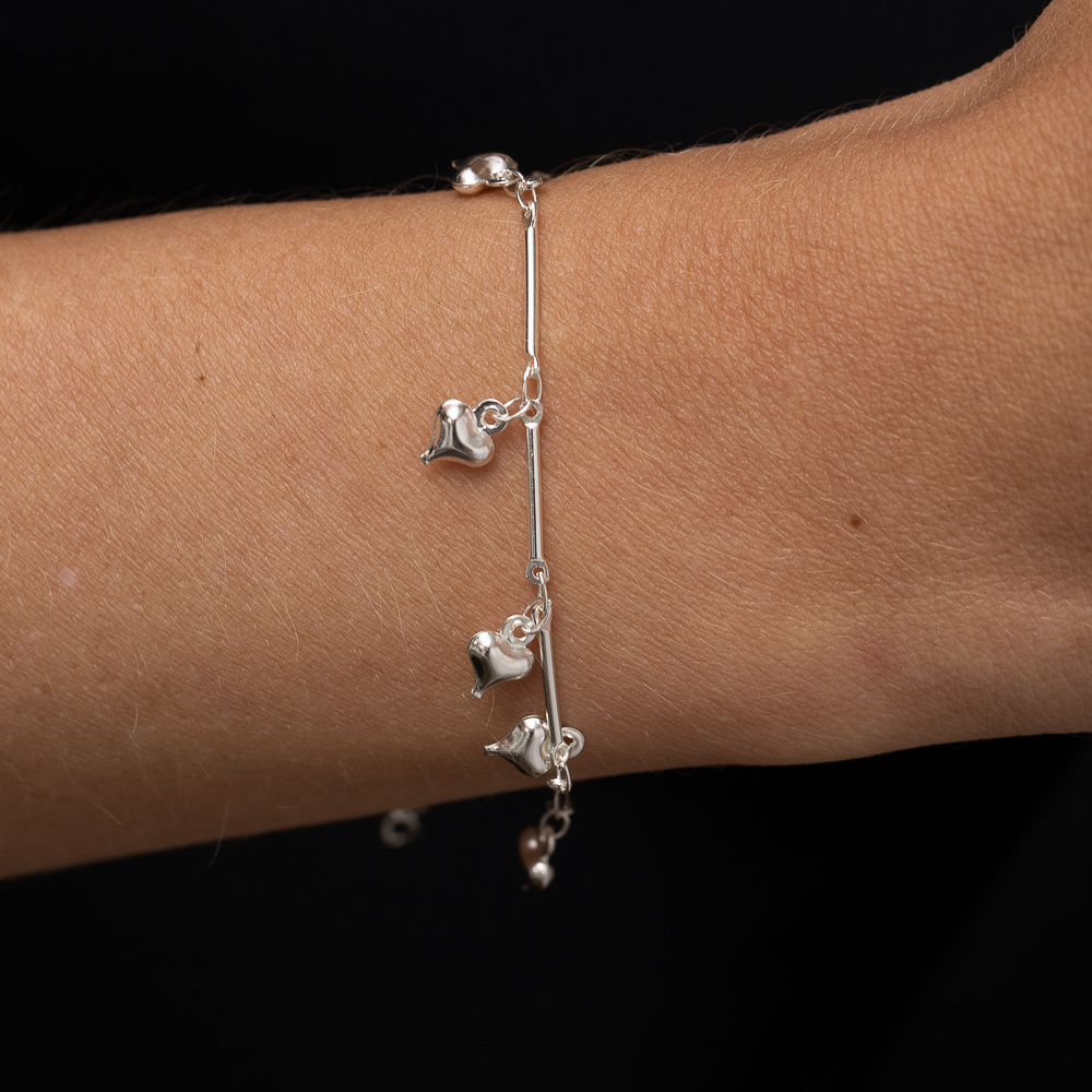 PULSEIRA PINGENTES CORAÇÕES CT BANHO PRATA