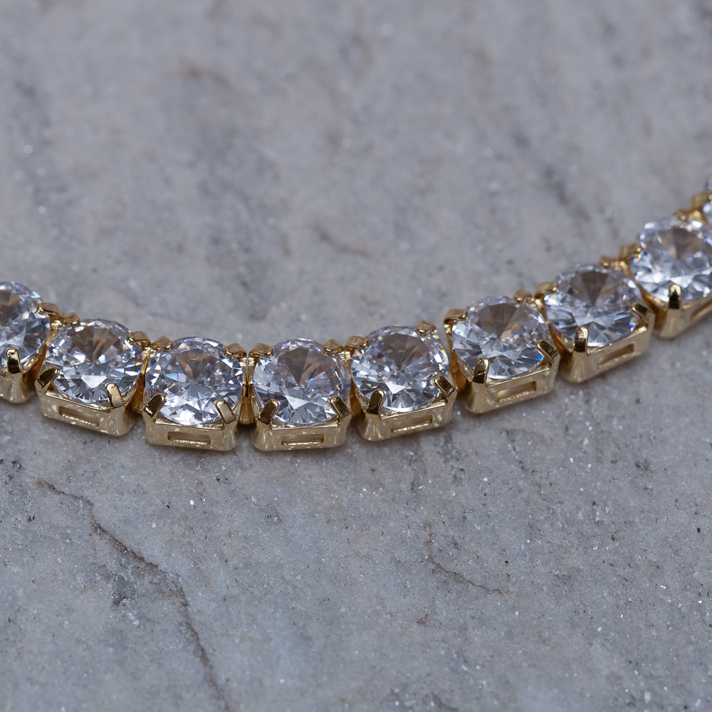 PULSEIRA RIVIERA GROSSA CRISTAL BANHO OURO 18K