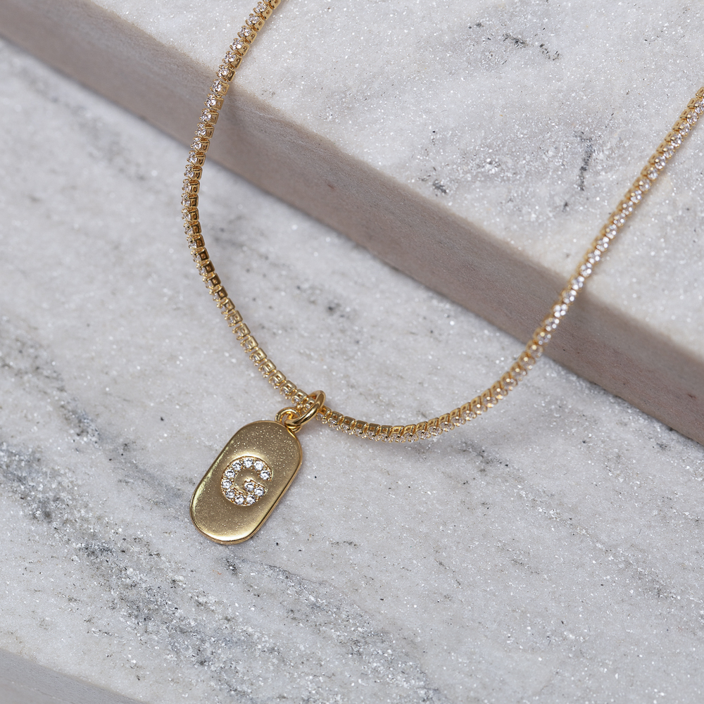 CHOKER RIVIERA PP COM LETRA G CRISTAL BANHO OURO 18K