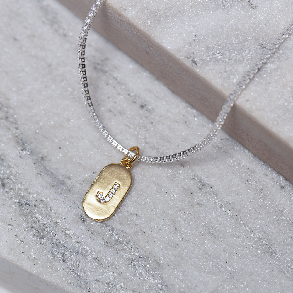 CHOKER RIVIERA PP COM LETRA J CRISTAL BANHO PRATA