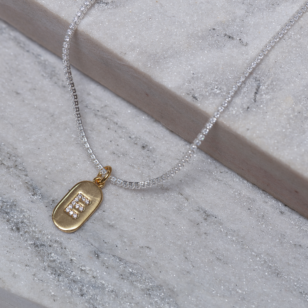 CHOKER RIVIERA PP COM LETRA E CRISTAL BANHO PRATA