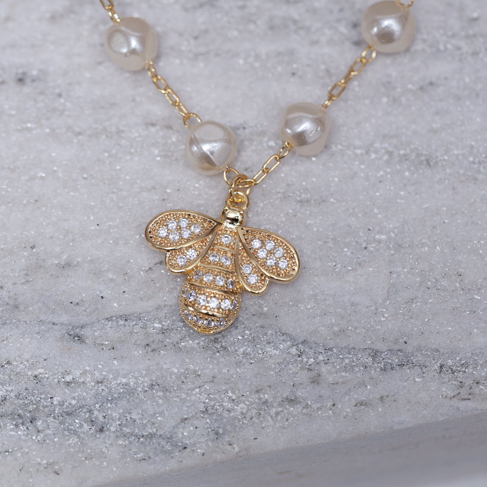 CHOKER PÉROLA COM LIBÉLULA EM ZIRCÔNIA BANHO OURO 18K