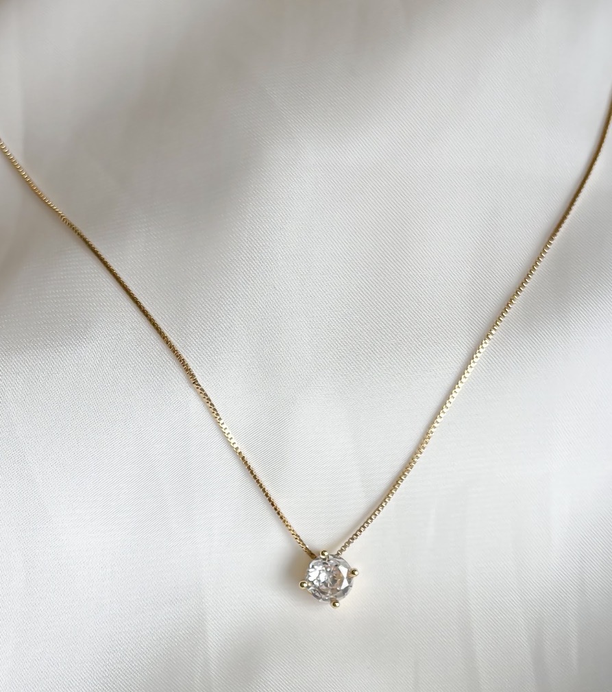 COLAR PONTO DE LUZ 6MM 4 GARRAS B. OURO