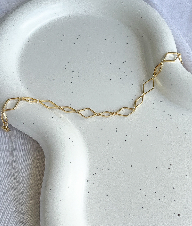 PULSEIRA LOSANGOS VAZADOS B. OURO