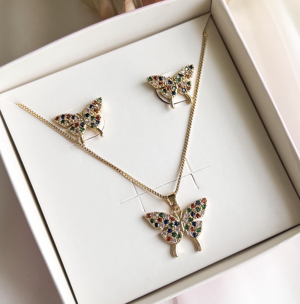 CONJUNTO BORBOLETA PERNINHA CRAVEJ. COLORS B. OURO