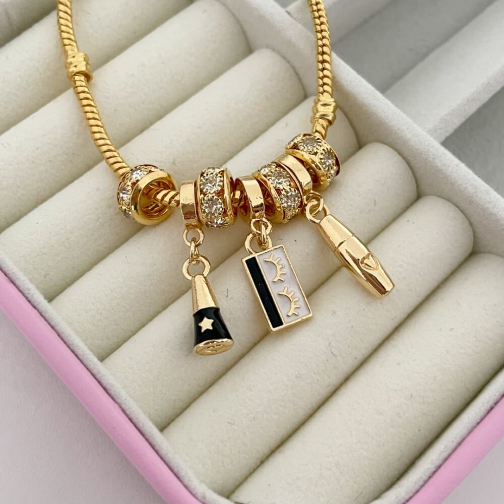 Berloque Delineador Plush Ouro