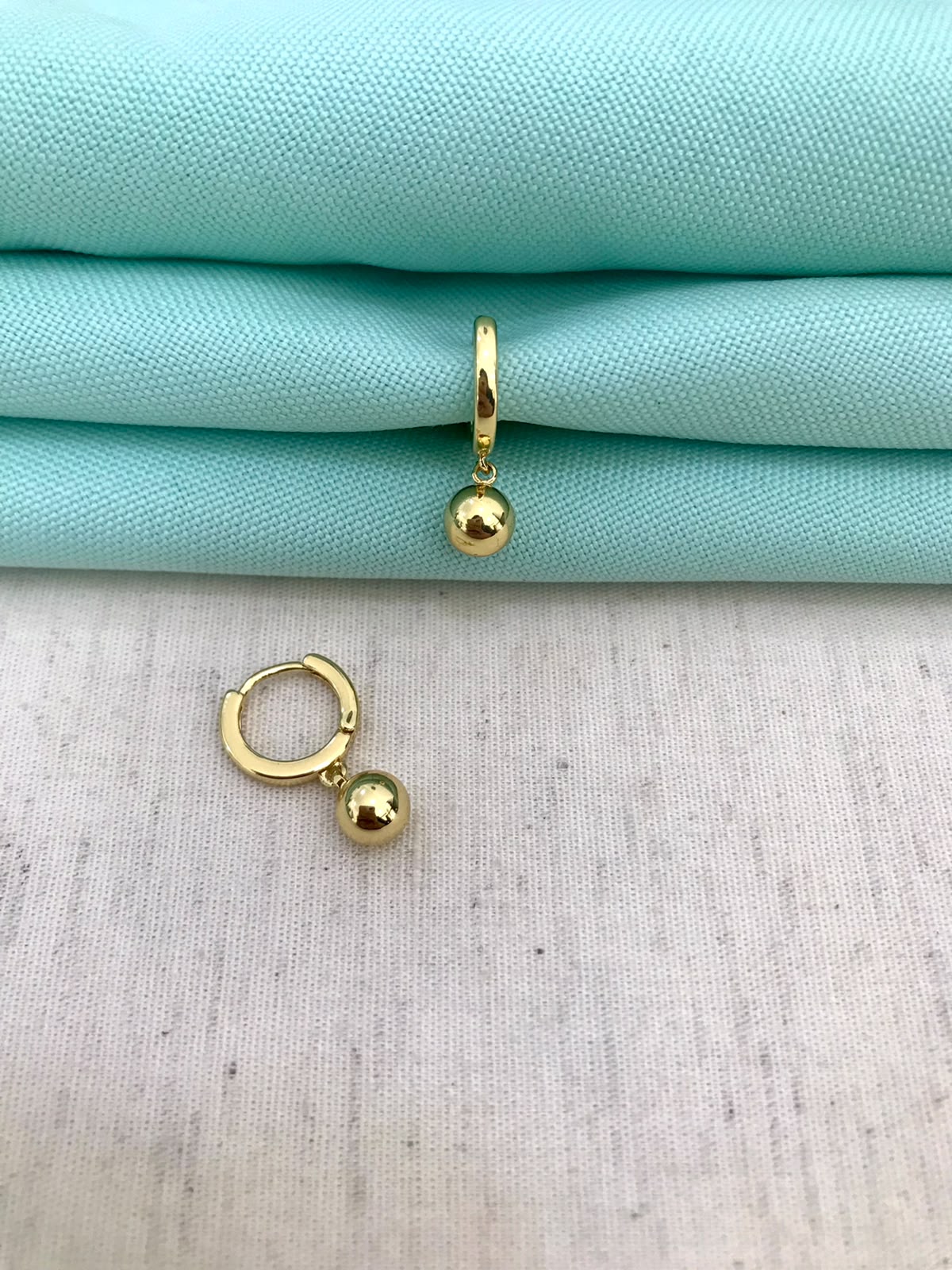 ARGOLA ESFERA G BANHADO A OURO