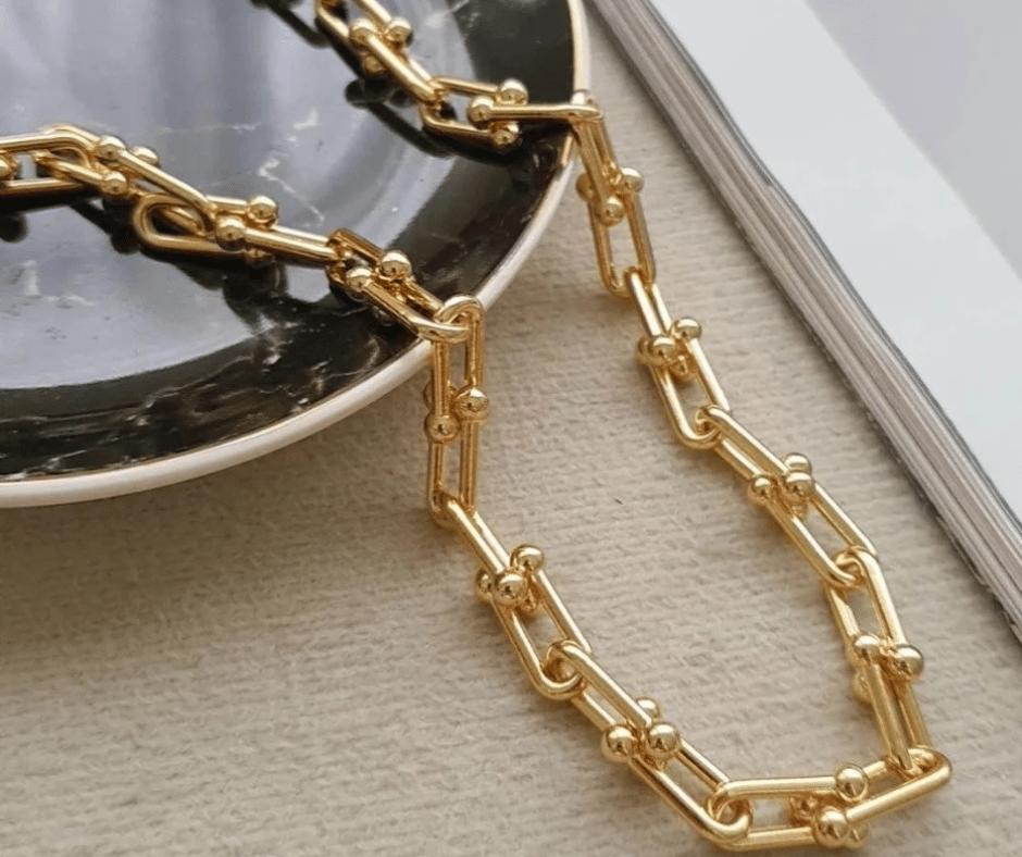 Choker cartier cadeado - Aço com banho de Ouro